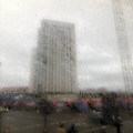 tower block through rainy window